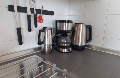 Sala Comacina Apartment | Cozy apartment with swimming pool, just a short walk from the lakeside.