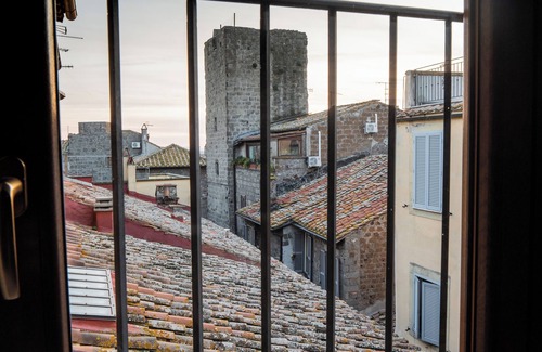 Viterbo Apartment | Cozy attic in a prestigious historic building, medieval center Viterbo