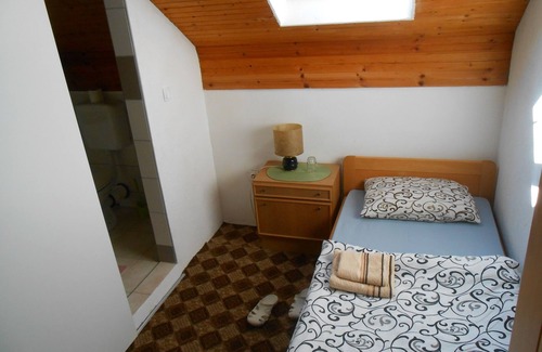 Jezerce House | Cozy attic room