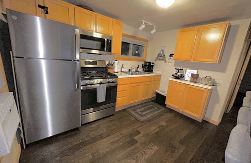 St Germain Cabin | COZY BEAR LODGE-On UTV/Snowmobile trail, Beachside Cabin w/Porch, Private dock