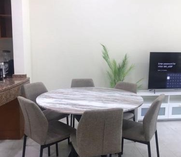 Dubai Investment Park Apartment | Cozy Bedroom Retreat in Green Community Pool View
