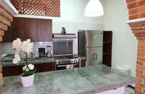 Colonia 5 de Diciembre Apartment | Cozy & Bright Apartment Near The Beach and Close Walk To Malecon