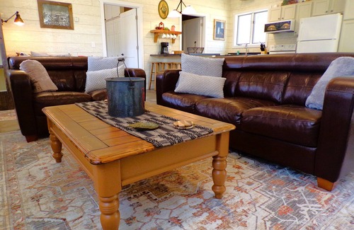 Spooner Cottage | Cozy cabin offers four seasons of fun! Recreate & relax on Mystery Lake!