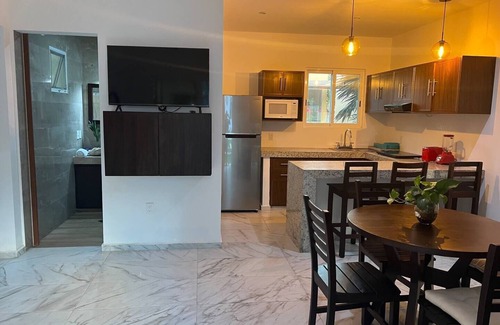 Isla Mujeres Condo | Cozy ground floor condo with Roof top and pool in Punta Sur
