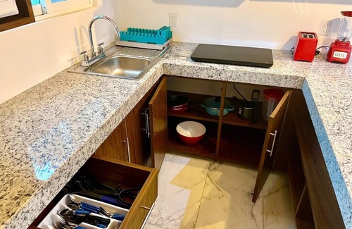 Isla Mujeres Condo | Cozy ground floor condo with Roof top and pool in Punta Sur