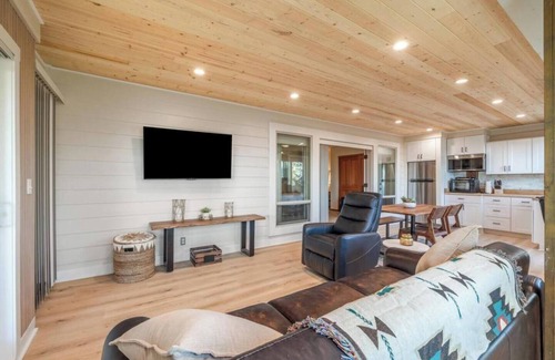 Sandpoint House | Cozy Guest House with Hot Tub, Dedicated Workspace & Views