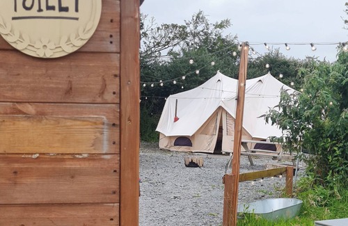 Llanfairpwllgwyngyll Cabin | Cozy Hot Tent with Log Burner & Hot Tub Right Tent