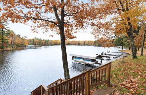 Eagle River Villa | Cozy lakefront villa w/shared docks, boat rentals & on-site restaurant - dogs OK