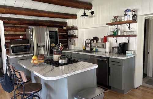 East Jordan Cabin | Cozy Log Cabin on the Jordan River. 20 minutes from Boyne Mountain!