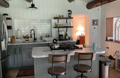 East Jordan Cabin | Cozy Log Cabin on the Jordan River. 20 minutes from Boyne Mountain!