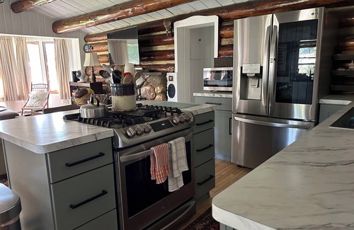 East Jordan Cabin | Cozy Log Cabin on the Jordan River. 20 minutes from Boyne Mountain!