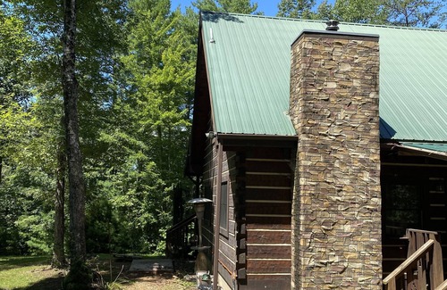Hartford Cabin | Cozy Log cabin tucked away in the Smokey Mountain, Pet friendly, Sauna, Hot Tub