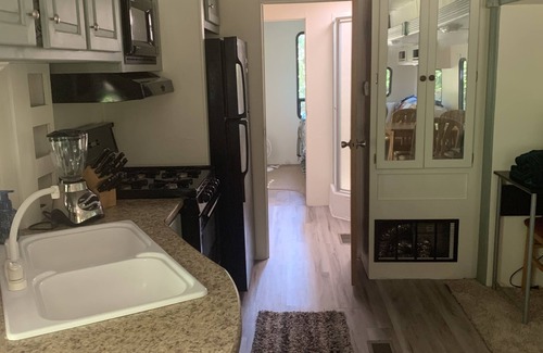 Peebles House | Cozy newly remodeled camper with hot tub and fire pit close to hiking/kayaking