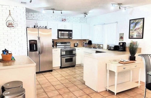Port Saint Lucie House | Cozy Port St Lucie getaway. Lanai Plus Private Heated Pool & Private Gardens