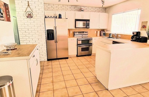 Port Saint Lucie House | Cozy Port St Lucie getaway. Lanai Plus Private Heated Pool & Private Gardens