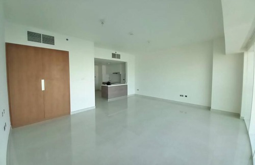 Al Raha Beach Apartment | Cozy Studio Apartment in a Waterfront Building