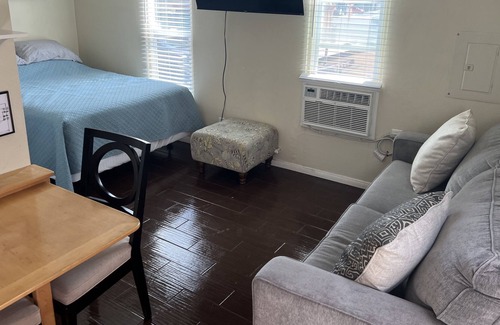 Sunset Beach Apartment | Cozy Sunset Beach Studio with Peek A Boo Ocean Views (Second Story/Dog Friendly)