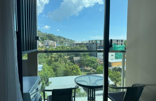 Cherngtalay Apartment | Cozy top floor apartment with washer & Wi-Fi