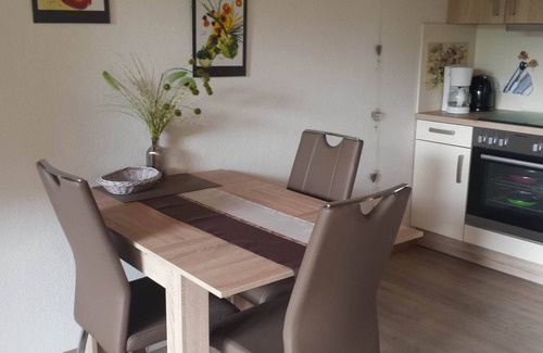 Dornumersiel Apartment | Cozy vacation apartment on the first floor, terrace in Dornumersiel Haus Juist