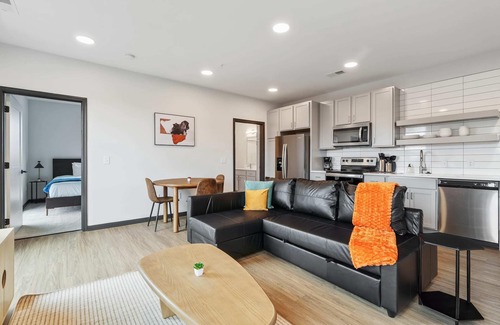 Lockerbie Square Apartment | CozySuites Mass with parking, lounge and roof deck 11