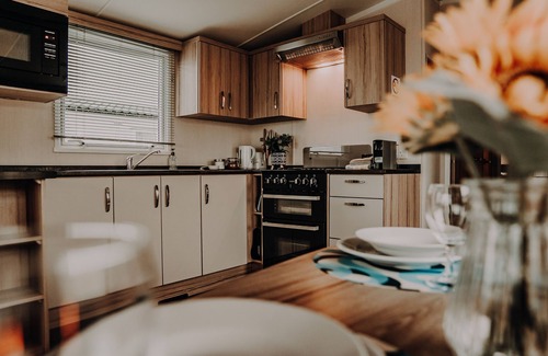 Ayr House | Craig Tara close to beach Dog friendly Free WiFi