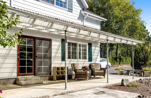 Bay City House | Creekside Home w/ a Furnished Patio, Firepit, Gas Fireplace, & Free WiFi