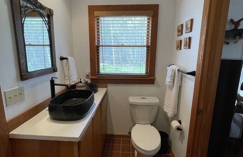 Claxton Cabin | Creekside Hunting and Fishing Cabin overlooking Lotts Creek on 190 acres