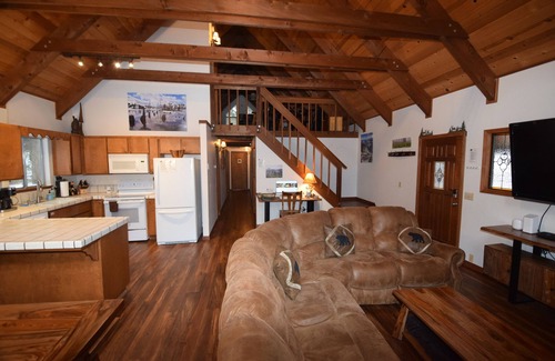 Dorrington Cabin | Dave's Den large game room loft, enjoy the large trees, swimming pool, adventure