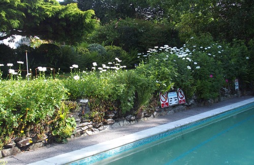 Lanreath Apartment | Daymer Apartment offers beautiful gardens, outdoor pool in summer and games room