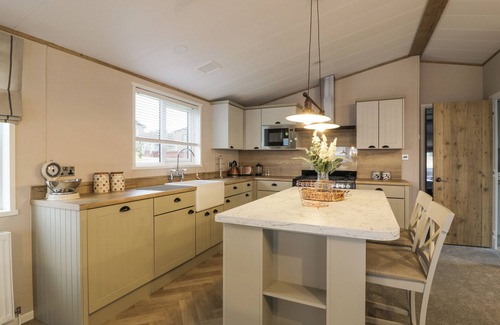 Balminnoch Cottage | DEBONAIR LODGE, with a garden in Glenluce