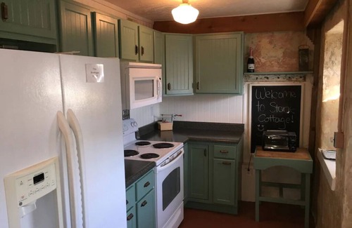 Hermann House | DeFlorin Stone Cottage, Hermann's Popular Downtown Home, Free Wine $20 Shuttle