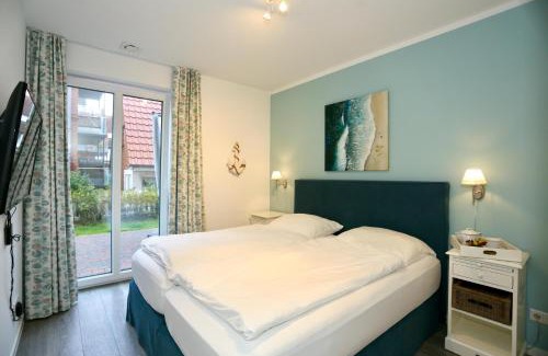 Juist Apartment | Deichsonne - mit Wintergarten und Blick Richtung Wattenmeer
