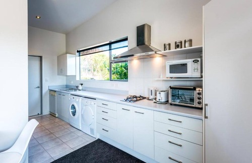 Matiatia Bay Apartment | Delamore Cove Summary