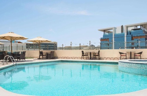 Al Muraqqabat House | Deluxe Room Near Al Rigga Metro by Luxury Bookings