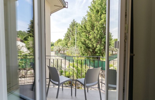 Pieve Vecchia Apartment | Deluxe Suite 2 with Shared Pool and Private Balcony