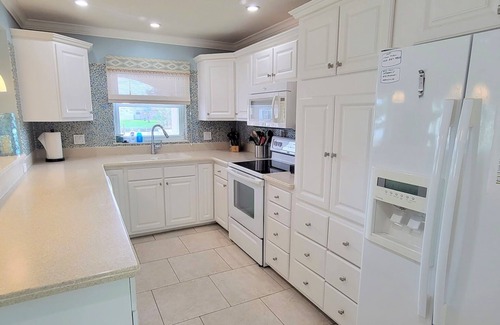 Cocoa Beach House | "Dive Into Fun! Spring & Summer Deals at Dolphin Cove – Walk to It All!"