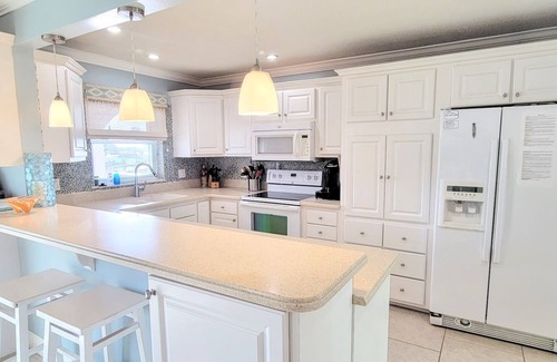 Cocoa Beach House | "Dive Into Fun! Spring & Summer Deals at Dolphin Cove – Walk to It All!"
