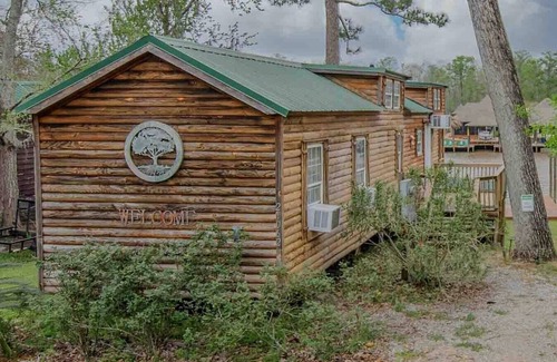 Maurepas Cabin | Dock Holiday - Waterfront/Nature/Hot Tub: Enjoy a cozy getaway!
