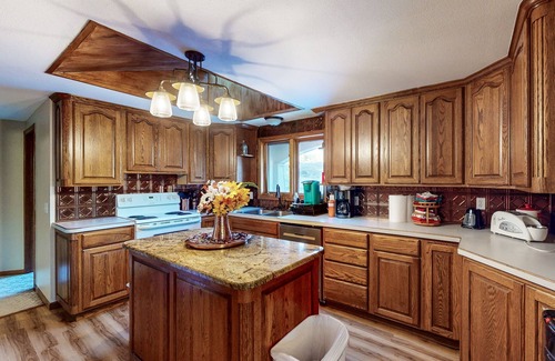 Sturgis Cabin | Dog-friendly cabin with private hot tub, foosball, pool table, arcade, fireplace
