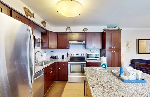 Kitty Hawk Condo | Dog-friendly condo with pool, tennis court, and modern amenities