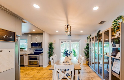 Miami Gardens House | Dog-friendly home with large yard, updated interior, Ping-Pong, & lawn games