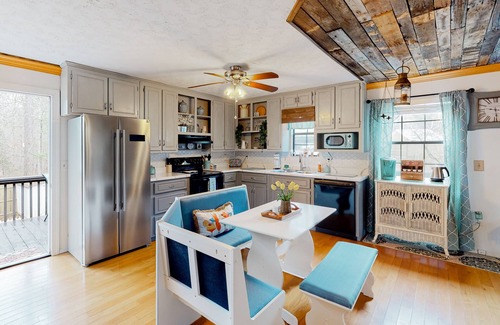 Morganton House | Dog-friendly home with wraparound deck, gas grill & fenced yard