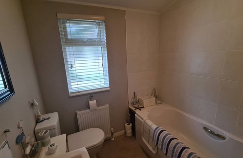Haveringland Cabin | Dog friendly lodge In a tranquil setting with 150 acres of beautiful forest