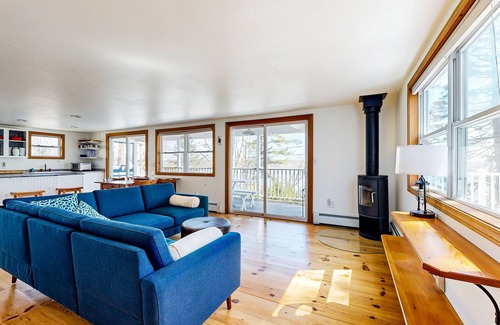 East Boothbay House | Dog-friendly river-view home with wood stove, deck, patio, dock, beach, grill