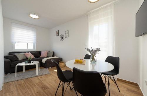 Kolan Apartment | Dolphin view with a pool by the beach