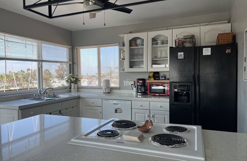 Mission Hills Apartment | Downtown Charm: Sleek 3-Bed/3-Bath Top-Floor with Deck & Cityscape Views