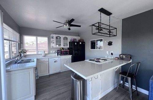 Mission Hills Apartment | Downtown Charm: Sleek 3-Bed/3-Bath Top-Floor with Deck & Cityscape Views