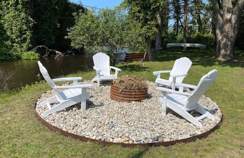 Grayling House | Downtown Grayling Riverfront Retreat-Welcome Hunters, Walk to Shops & Dining