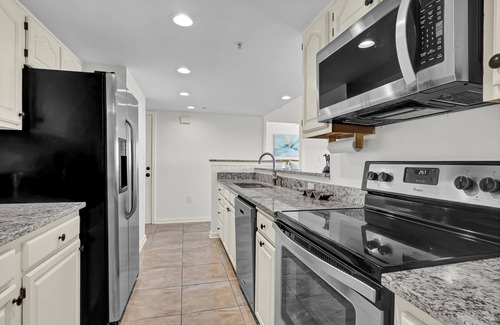 Shell Island Condo | DR 2103 - Beautifully updated condo with pool, tennis, and elevator