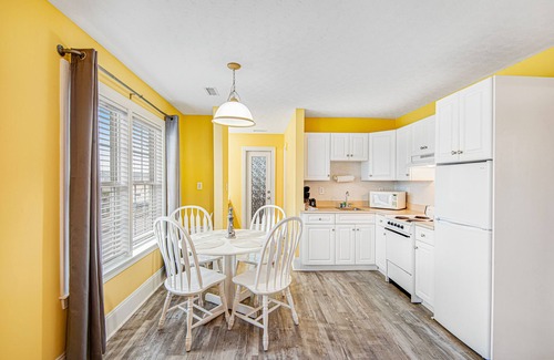 Surf City House | Dreamy ocean-view suite with pool, central AC, full kitchen, patio, & balcony